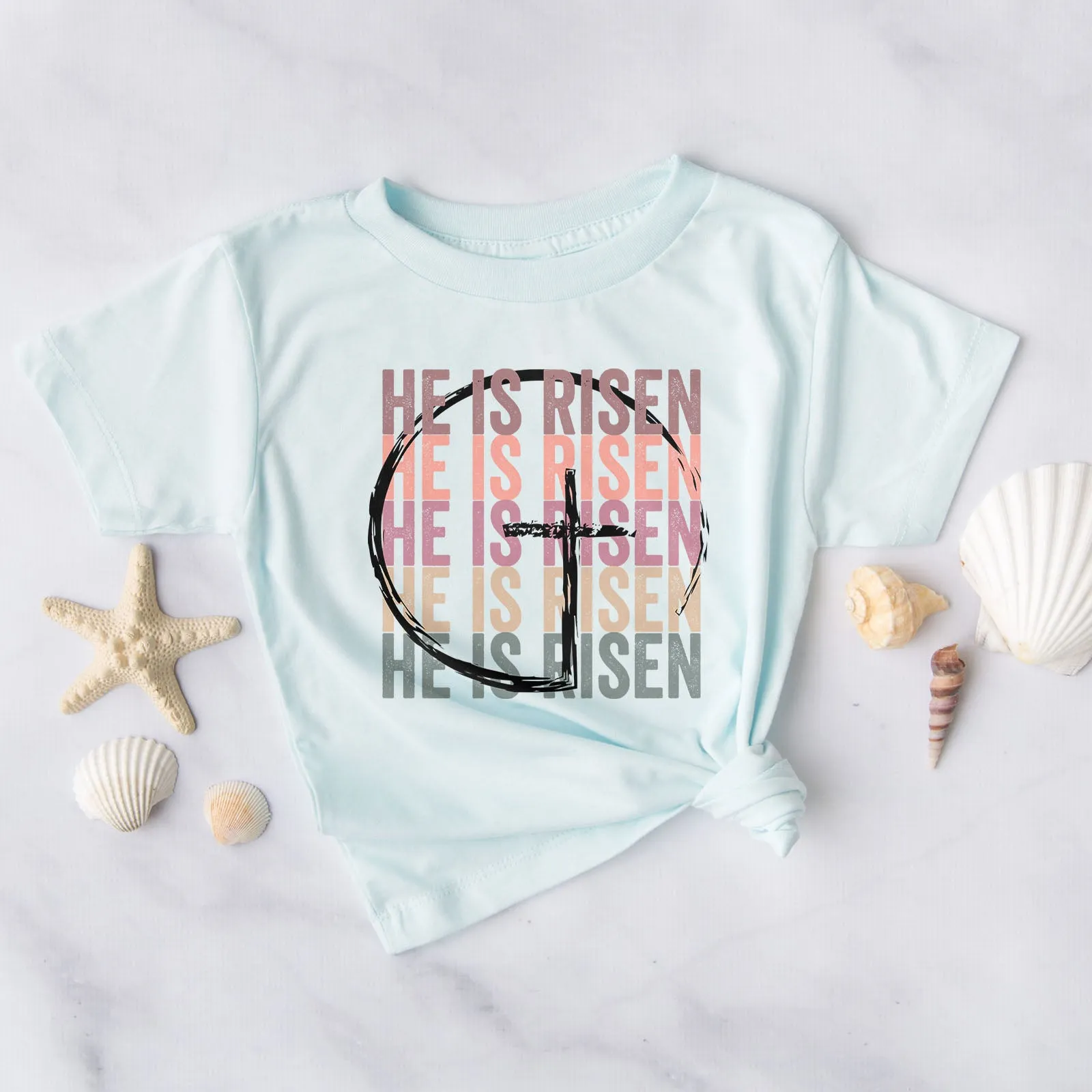 He Is Risen Stacked Easter Rainbow Tee
